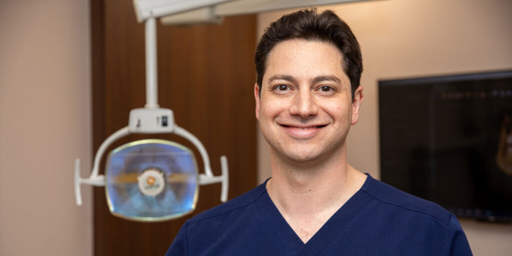 Headshot of doctor inside of the dental center