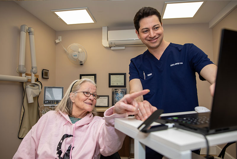 patient and doctor going over dental procedure information