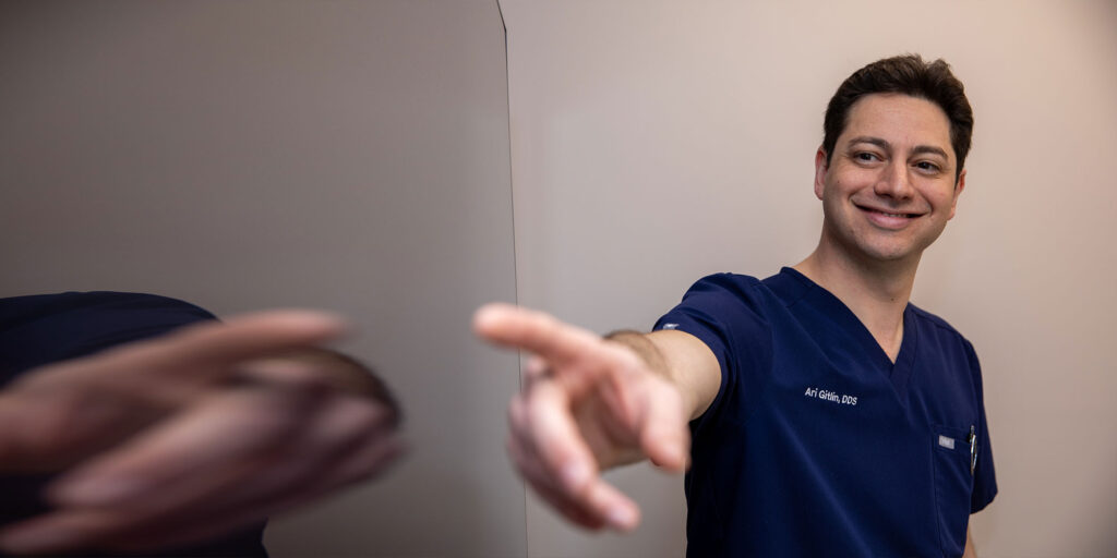 doctor going over dental procedure information