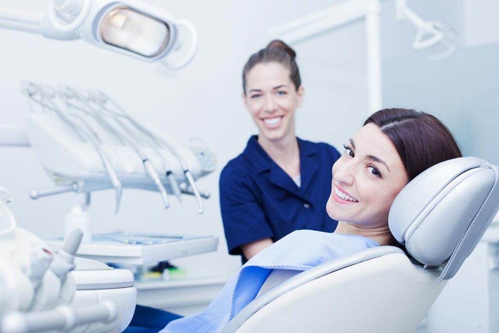 Dental Implants Patient Smiling in the Chair