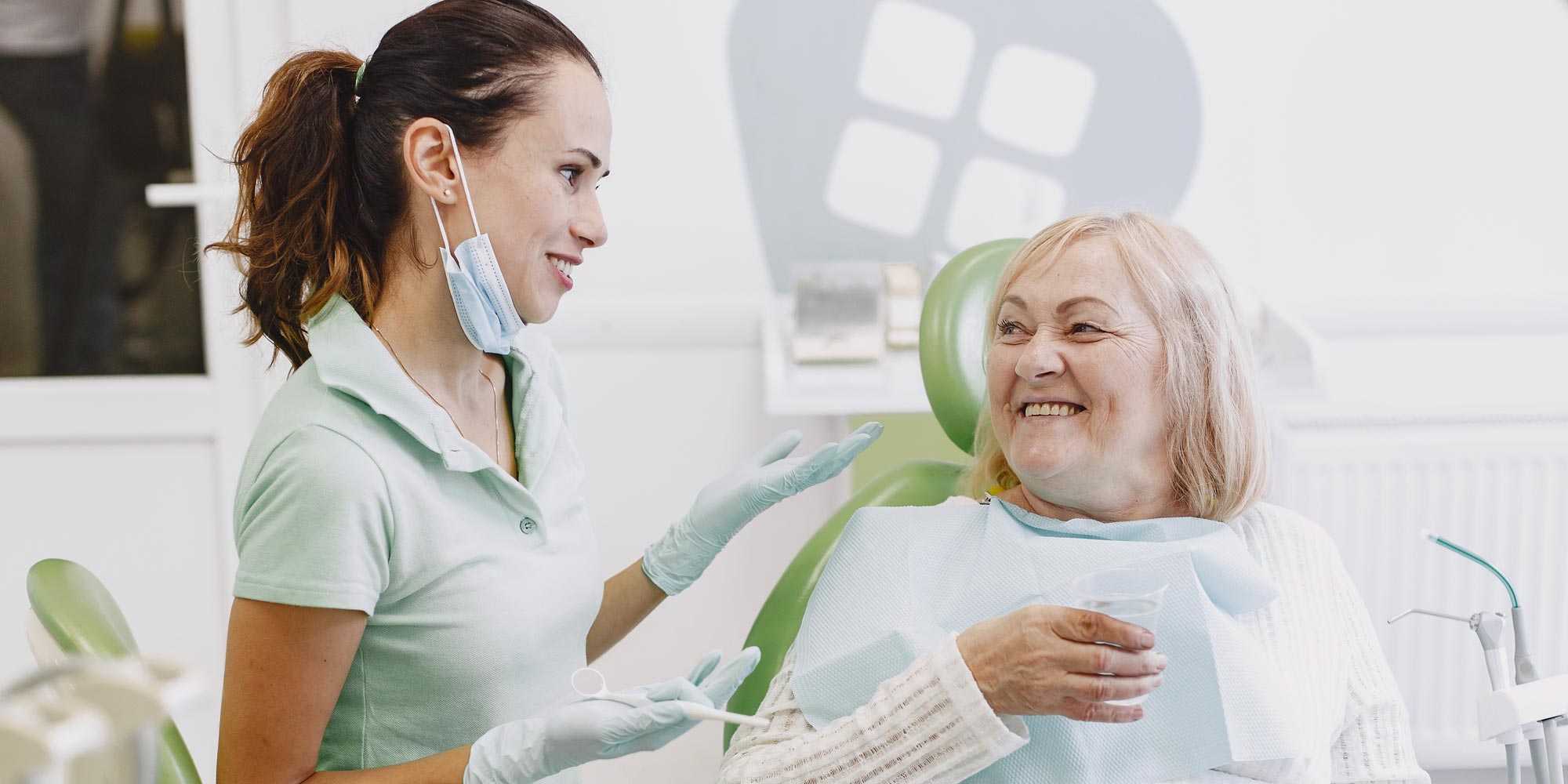 Dental Patient sitting with Dentist