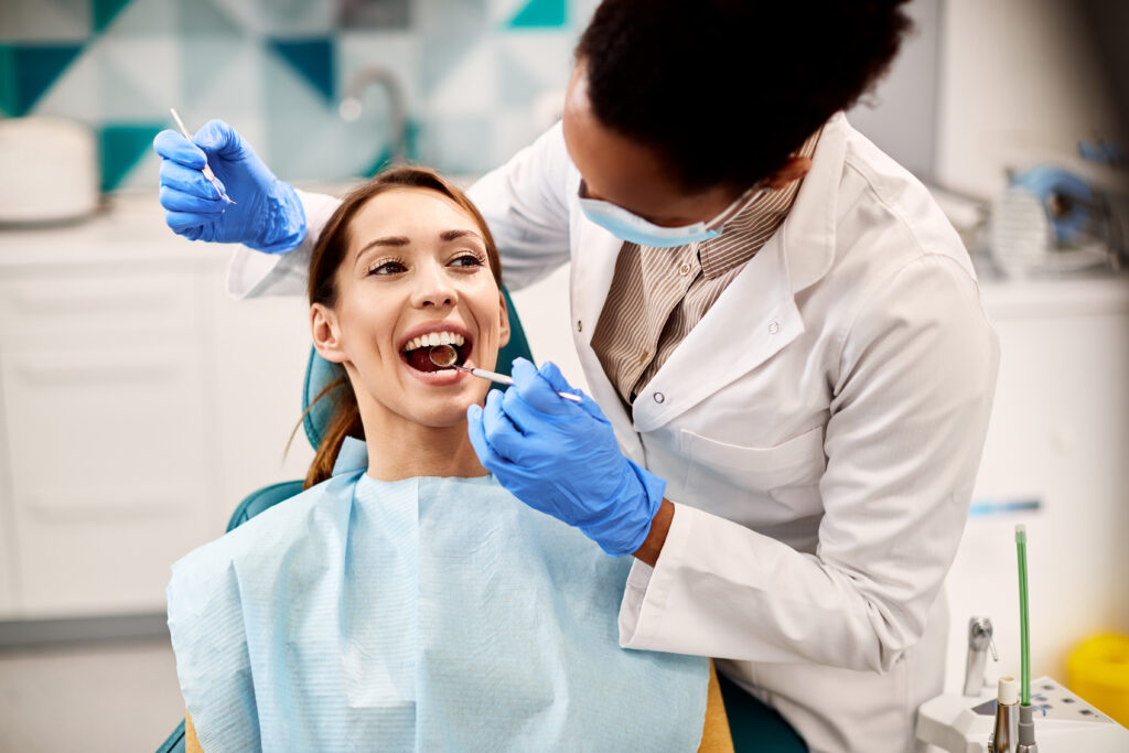 Woman having her teeth examined during a dental appointment